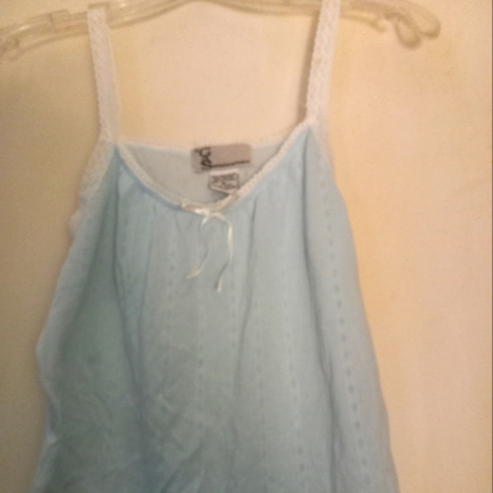 Used,not new light blue cotton/poly tiny size medium  camisole with  lace straps